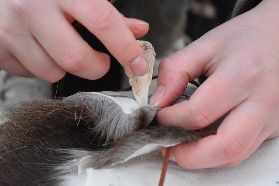 Stone awl in action